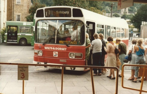 Passengers board a Wilts and Dorset Leyland National at Bath in 1984